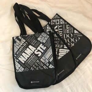 Set of three Lululemon shopping bags